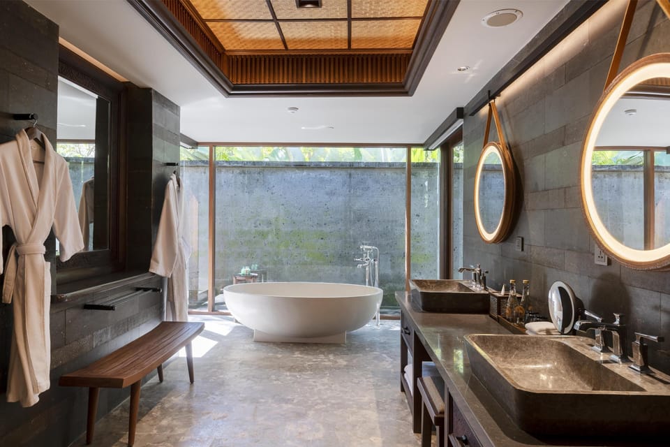 Separate tub and shower, rainfall showerhead, free toiletries