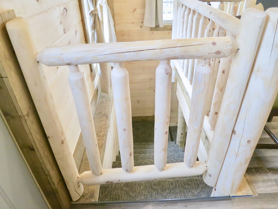 Stairway is gated to keep pets and children safe