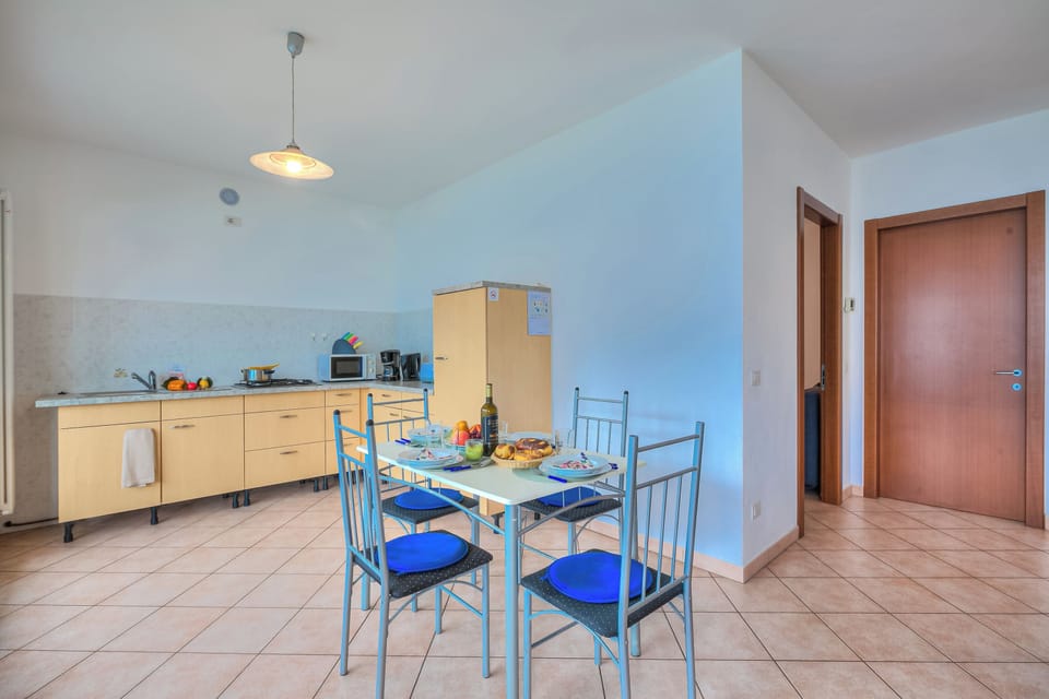 Family Apartment, 1 Bedroom, Microwave, Mountainside (Va Pensiero sul Lago: Lake Maggiore) | Dining
