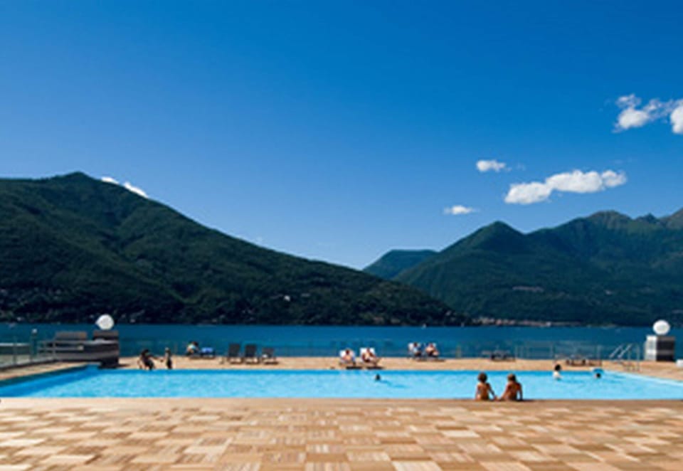 Family Apartment, 2 Bedrooms, Terrace, Lakeside (Vista di Maccagno Fantastico Pool) | Pool | Seasonal outdoor pool