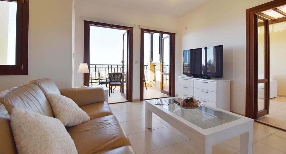 Apartment, 1 Bedroom | Living area | Flat-screen TV