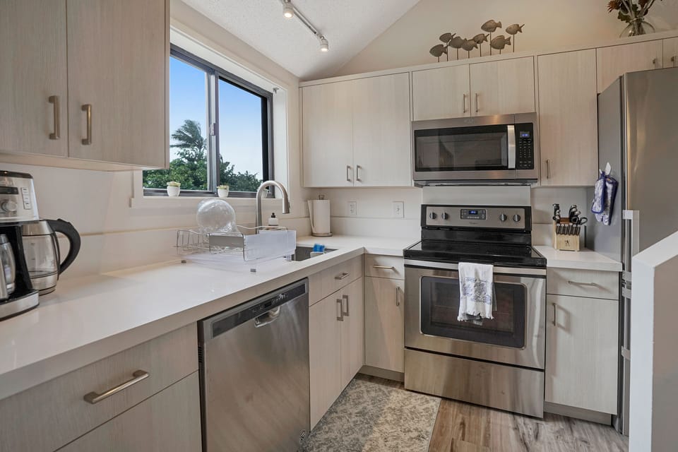 Cook with ease in the updated kitchen with stainless steel appliances and everything you need for your stay.