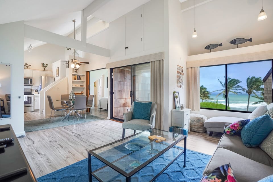 Relax in the open living space with ocean views and plenty of room to unwind together.