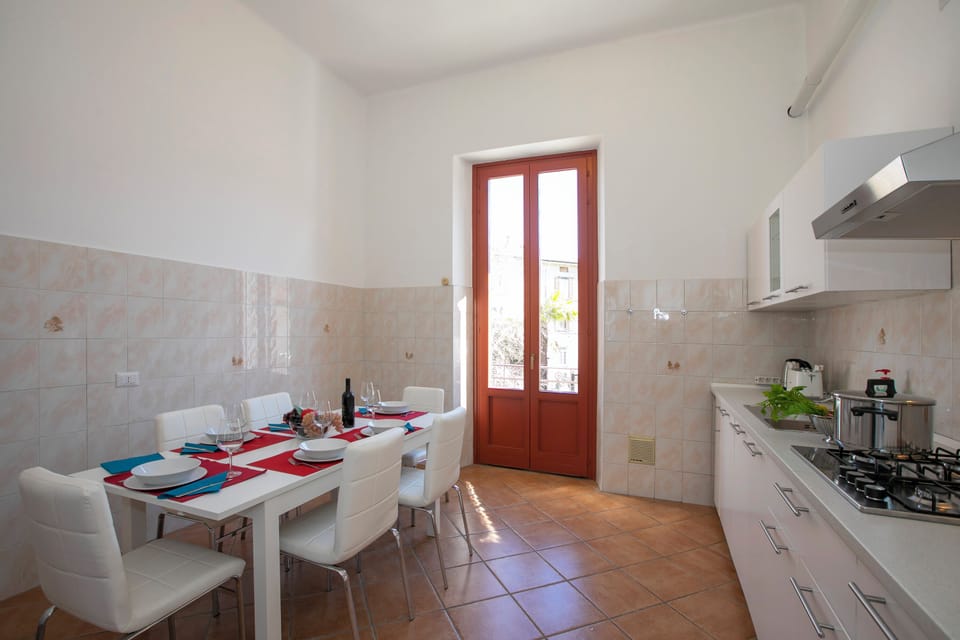 Family Apartment, 2 Bedrooms, Balcony, Lakeside (Residenza Gardenia - Lake View) | Private kitchen | Coffee/tea maker, full-size fridge, microwave, oven