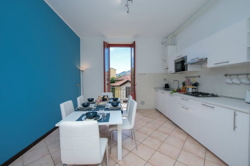 Family Apartment, 2 Bedrooms, Balcony, Lakeside (Residenza Oleandro - Lake View) | Private kitchen | Coffee/tea maker, full-size fridge, microwave, stovetop