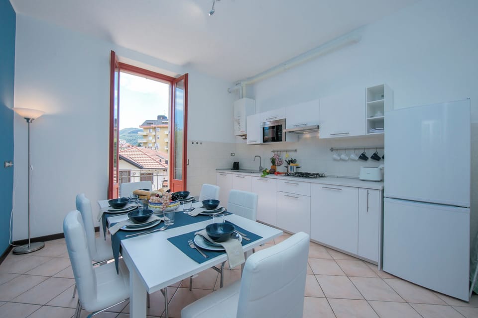 Family Apartment, 2 Bedrooms, Balcony, Lakeside (Residenza Oleandro - Lake View) | Private kitchen | Coffee/tea maker, full-size fridge, microwave, stovetop