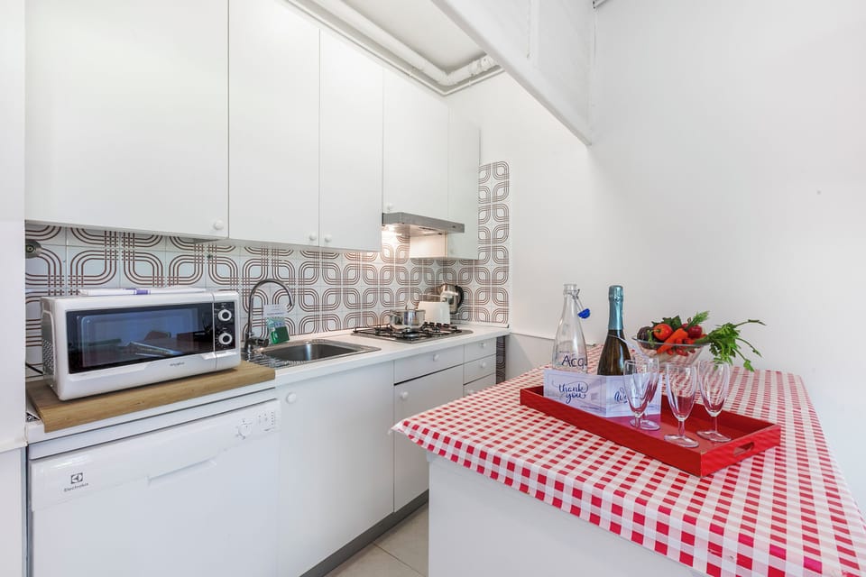 Family Apartment, 2 Bedrooms, 2 Bathrooms (Rododendro Rosso) | Private kitchen | Oven, stovetop, dishwasher, toaster