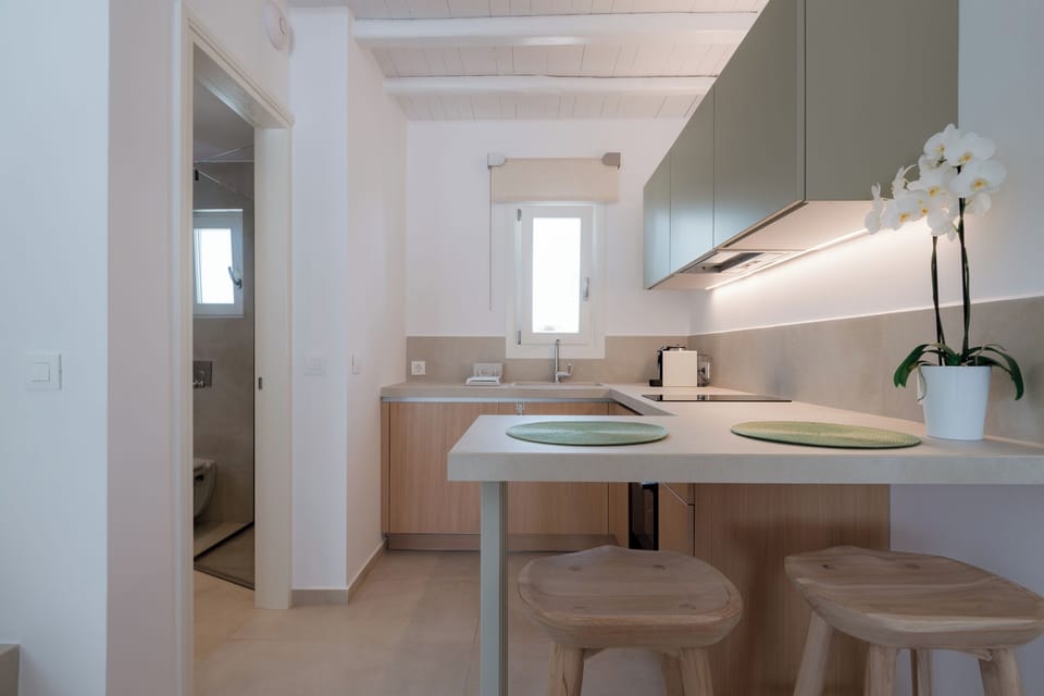 Deluxe Duplex, 2 Bathrooms, Sea View | Private kitchen | Fridge, espresso maker, electric kettle