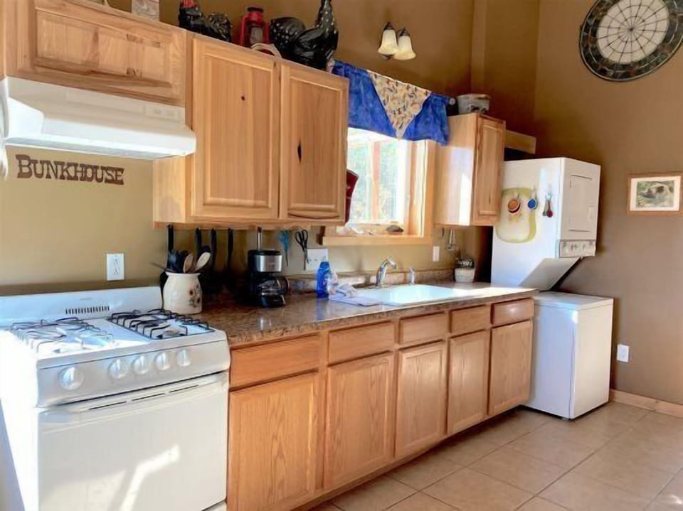 The light filled kitchen makes preparing meals a pleasure.