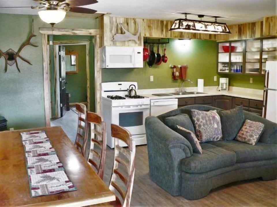 Walking in, you'll find the open and bright living, dining and kitchen area.