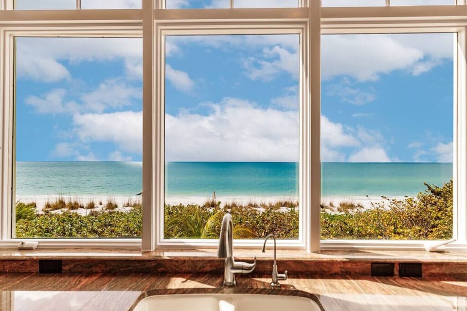 Soaking tub with dreamy Gulf view right outside your window