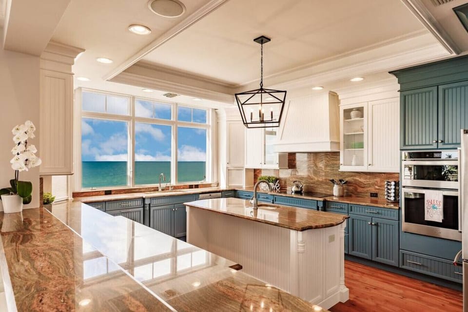 Gourmet kitchen with custom cabinetry and premium appliances