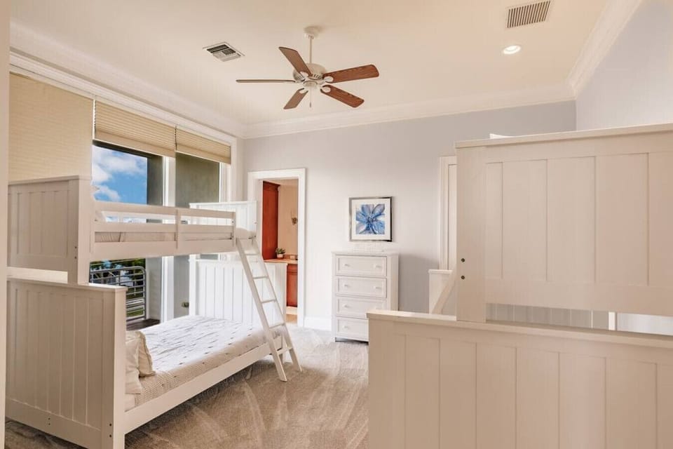 Cheerful bunk room with two twin bunks and ample natural light
