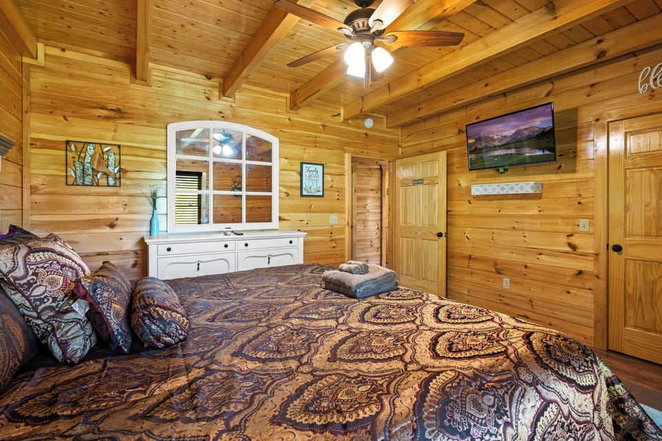 Main-level king bedroom #1 — no stairs to reach it.