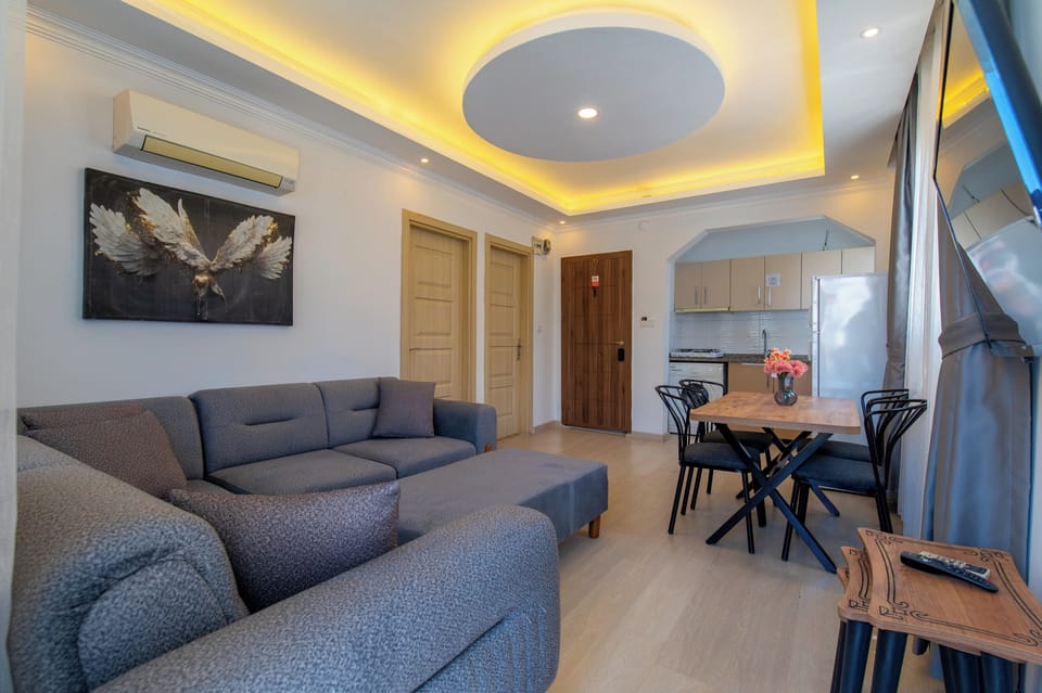 Family Apartment, 1 Bedroom | Living area | 32-inch LCD TV with satellite channels