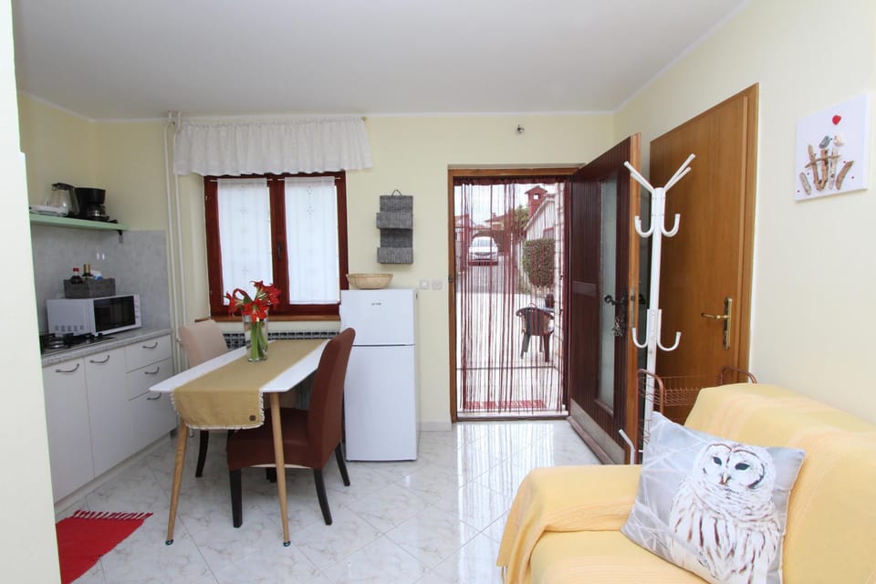 Apartment, 1 Bedroom | Living room | Flat-screen TV