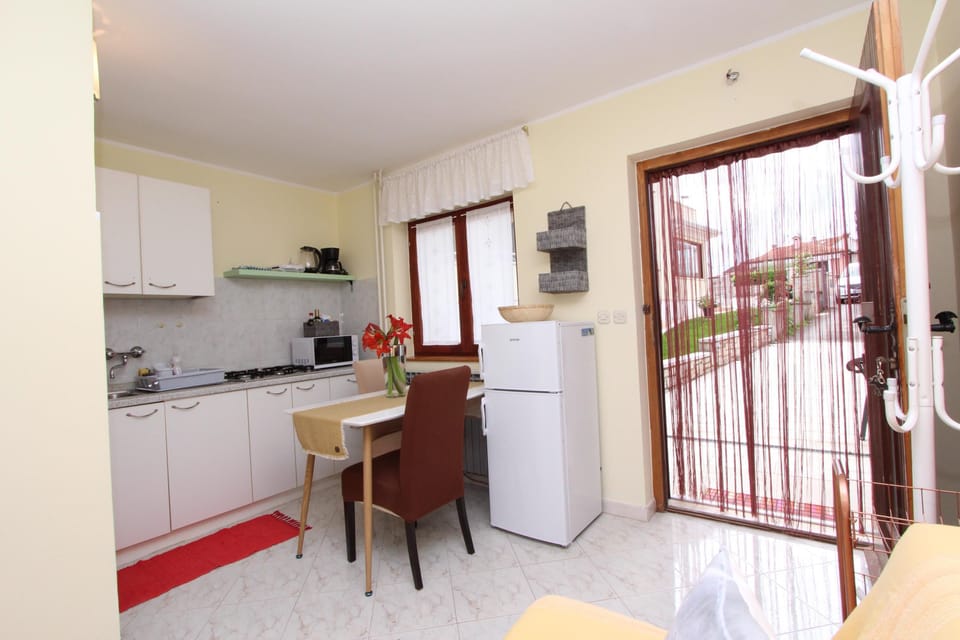 Apartment, 1 Bedroom | Living area | Flat-screen TV