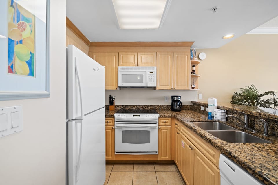 Fully Stocked Kitchen with Bar Seating