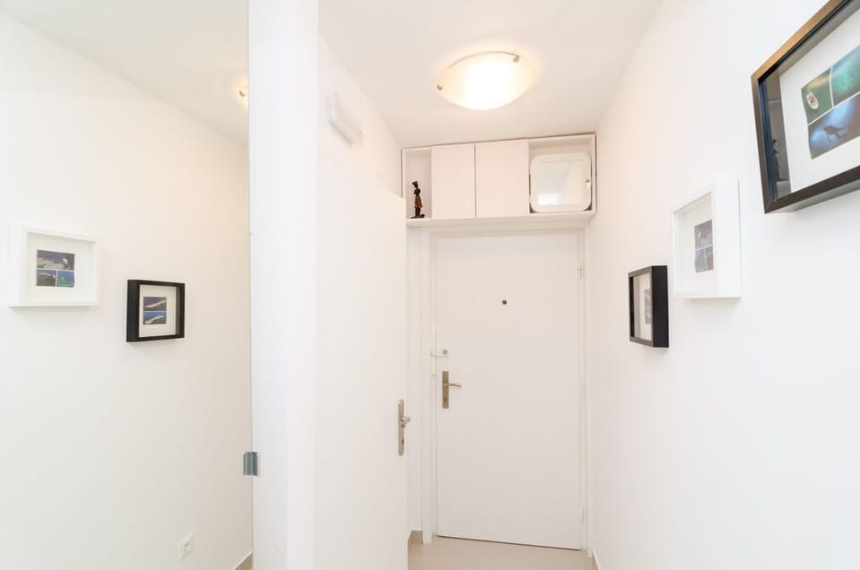 Standard Apartment, 1 Bedroom | Living area | Flat-screen TV