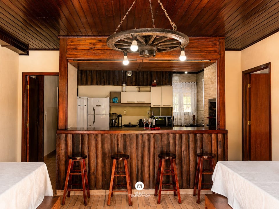 Premium Cottage | Private kitchen | Fridge, toaster oven, cookware/dishes/utensils, dining table