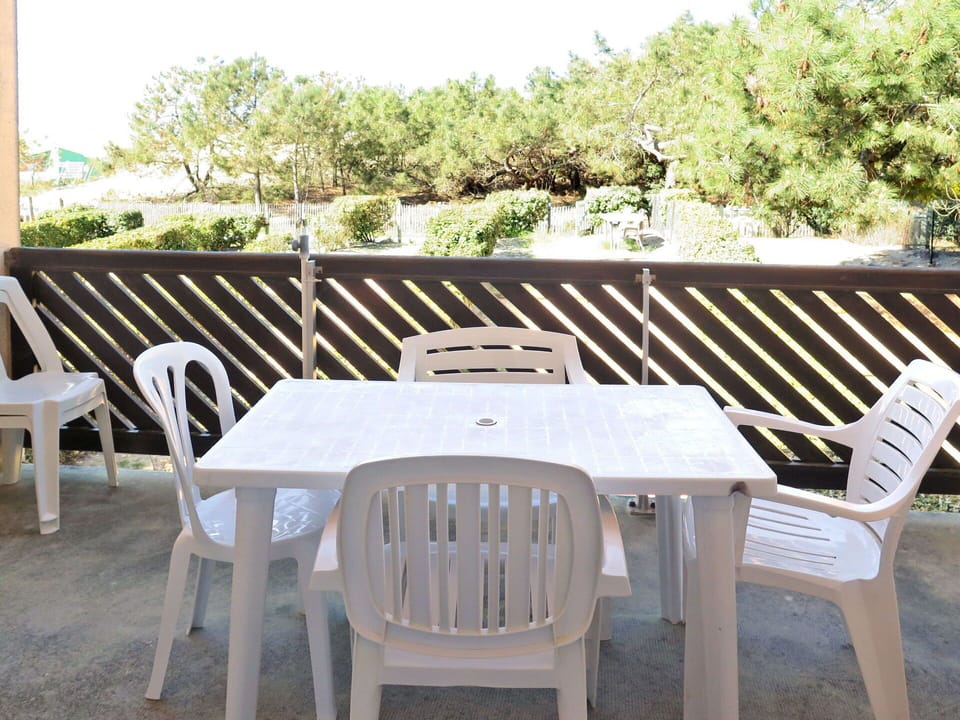 Table, Furniture, Property, Sky, Chair, Outdoor Table, Outdoor Furniture, Wood, Tree, Rectangle