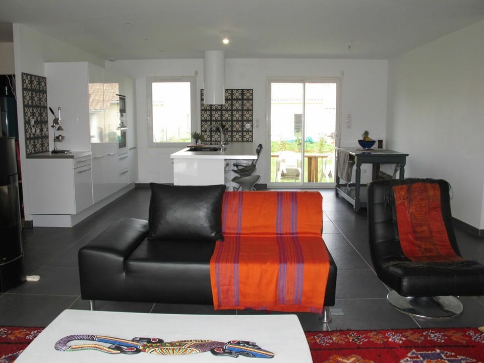 Couch, Furniture, Property, Table, Comfort, Picture Frame, Living Room, Studio Couch, Interior Design, Floor