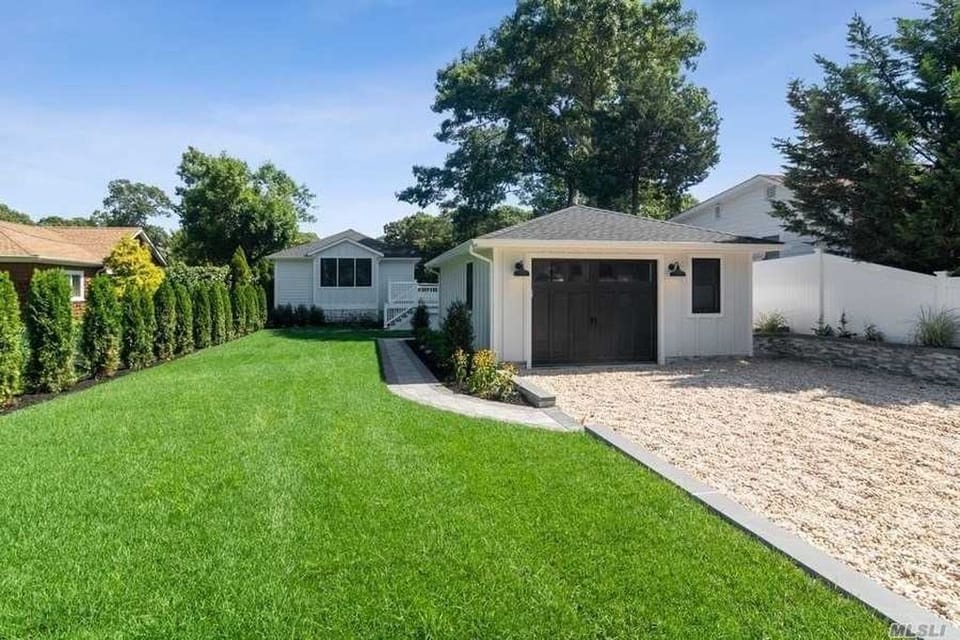 Oversized garage, private property, great setback. 