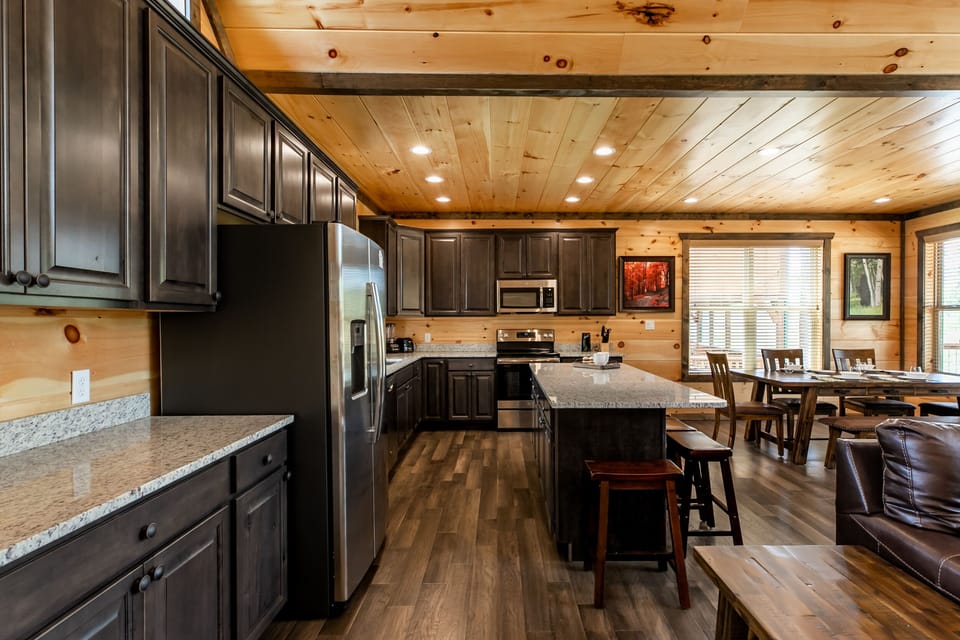 Modern kitchen with all the essentials, plenty of storage, and a large island