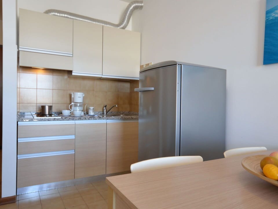 Cabinetry, Furniture, Property, Countertop, Building, Wood, Kitchen, Table, Sink, Tap