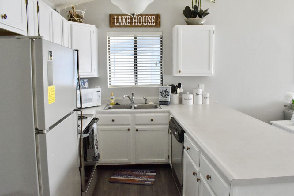 Oven, Stove, Refrigerator, Dishwasher, Garbage Disposal.
