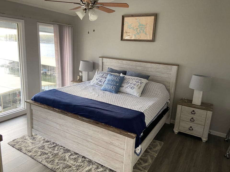 Master bedroom.  King size bed with a view!  Bedside tables with chargers! 