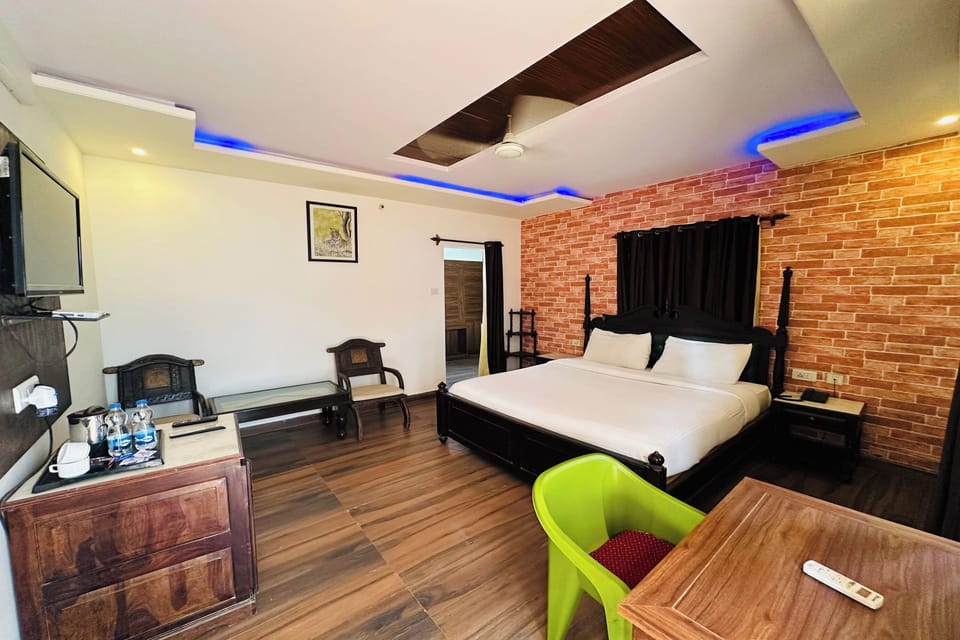 Deluxe Room | Minibar, desk, blackout drapes, iron/ironing board (on request)