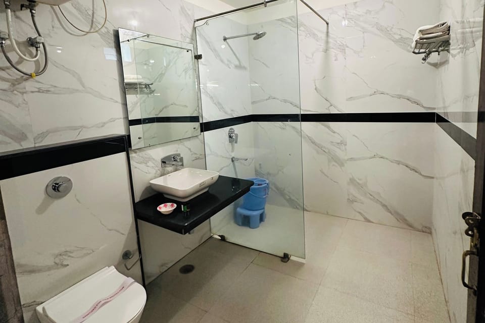 Shower, free toiletries, hair dryer (on request), slippers