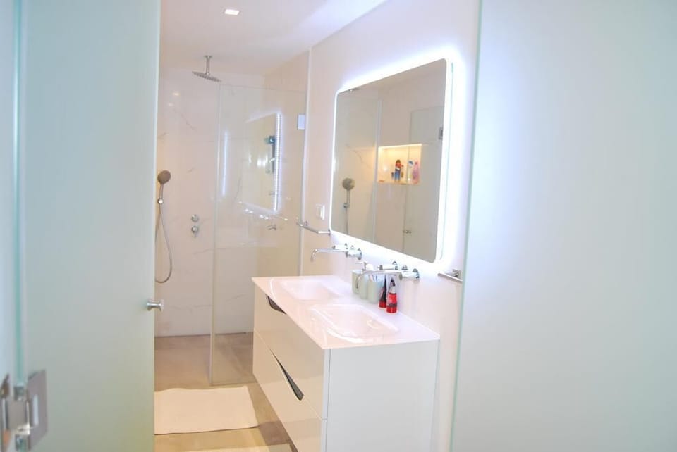 Master Bathroom with a walk-in shower and bathtub