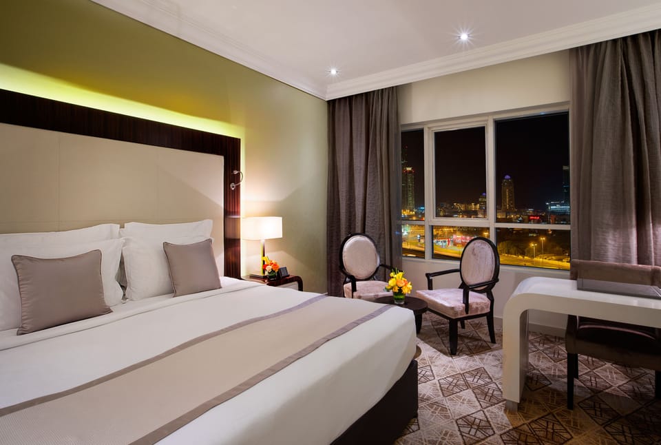 Classic Room, 1 King Bed | Premium bedding, minibar, in-room safe, individually decorated