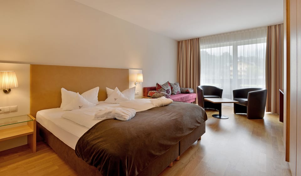 Triple Room, Balcony | In-room safe, cribs/infant beds, free WiFi