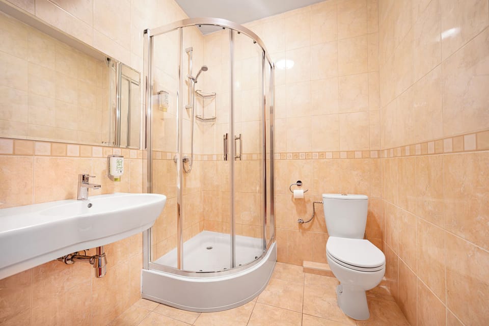 Designer toiletries, hair dryer, towels, soap