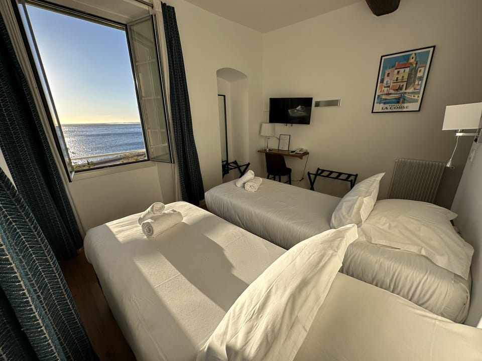Comfort Twin Room, Sea View | Pillowtop beds, iron/ironing board, free WiFi, bed sheets