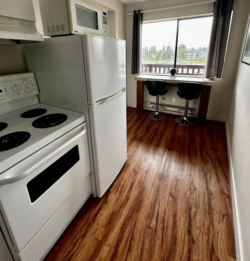 Classic Room, 2 Queen Beds, Kitchen, Harbor View | Private kitchen | Coffee/tea maker