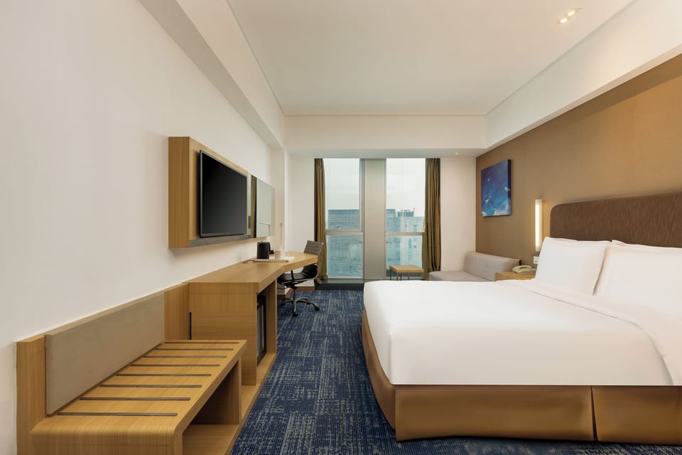Premium bedding, down comforters, in-room safe, desk