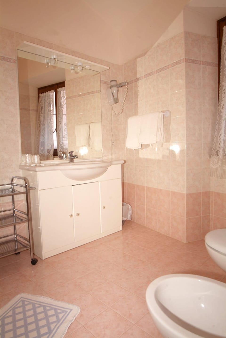 Free toiletries, hair dryer, bidet, towels