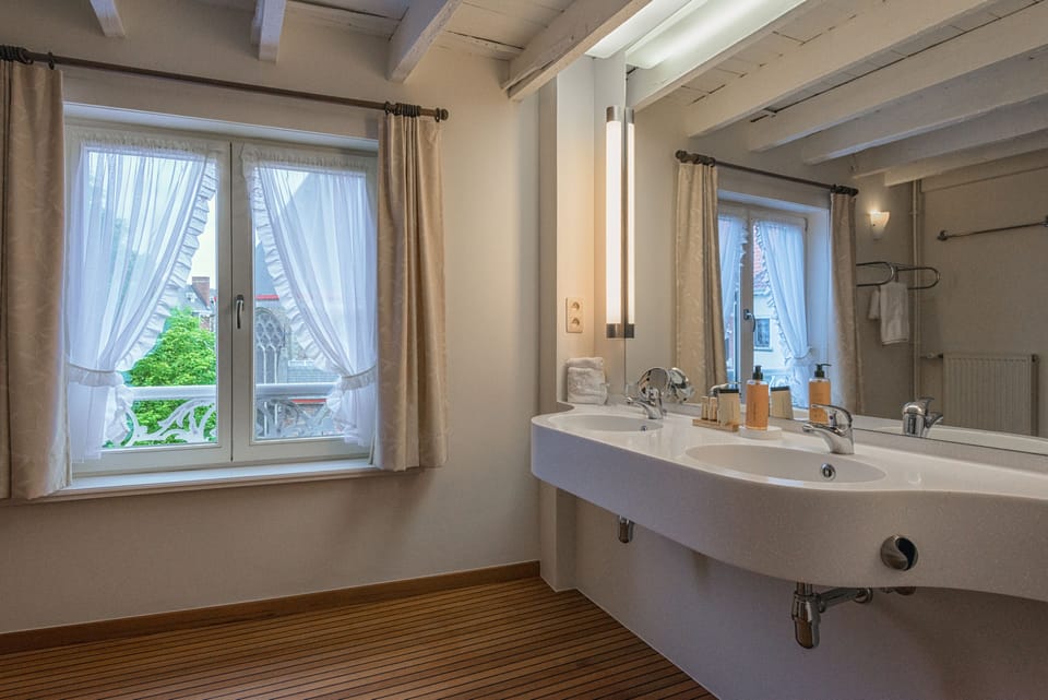 Romantic Suite, 1 King Bed, City View | Bathroom | Eco-friendly toiletries, hair dryer, towels, soap