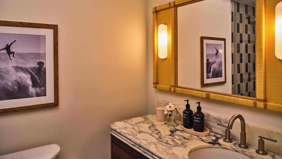 Shower, designer toiletries, hair dryer, bathrobes