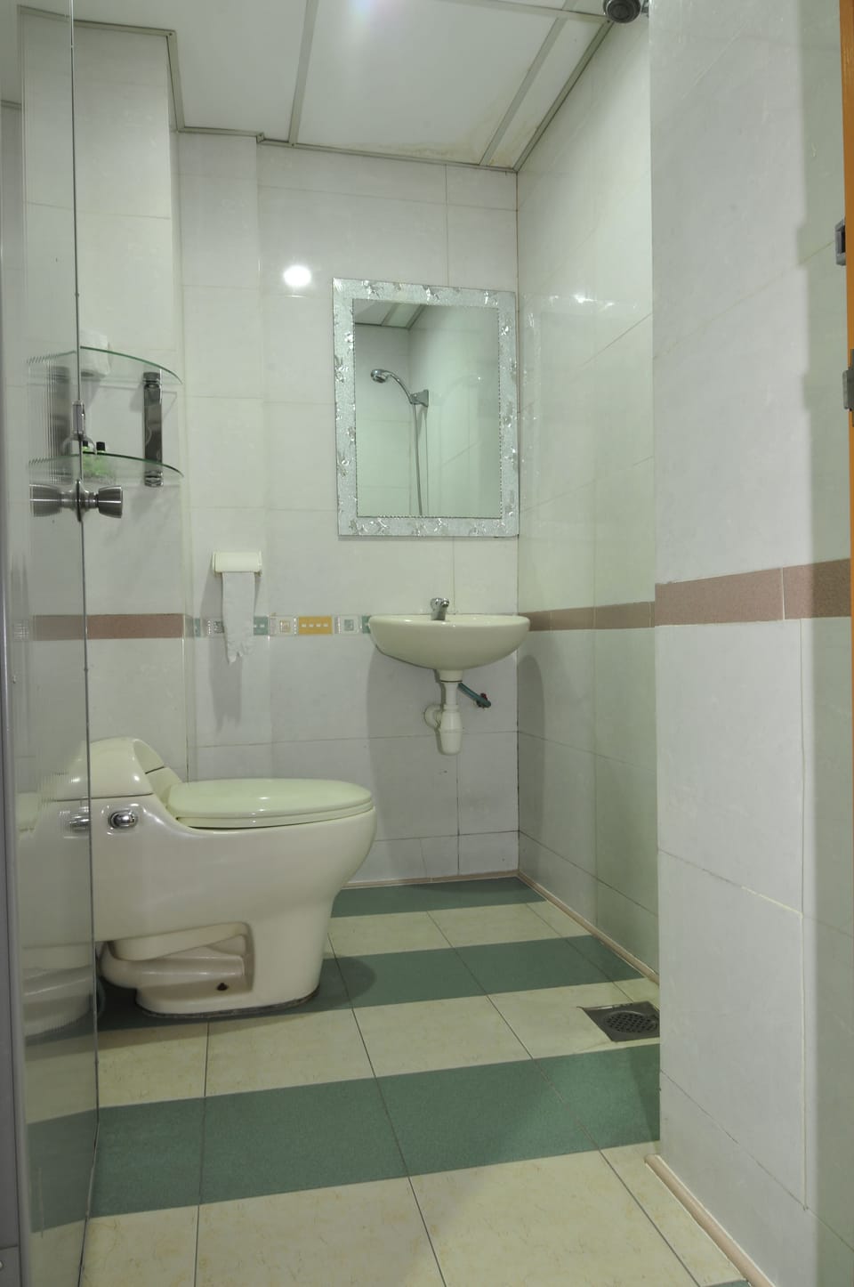Shower, free toiletries, hair dryer, slippers