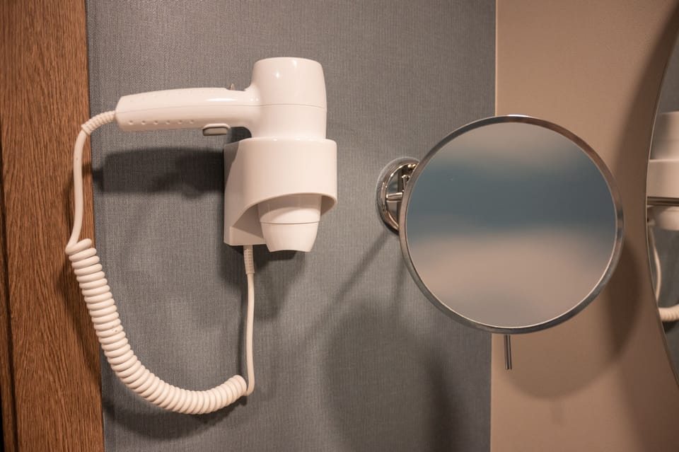 Shower, eco-friendly toiletries, hair dryer, towels