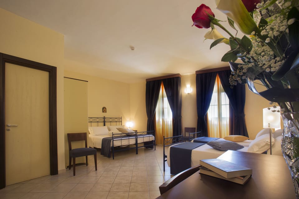Panoramic Quadruple Room, Sea View | Minibar, in-room safe, desk, soundproofing
