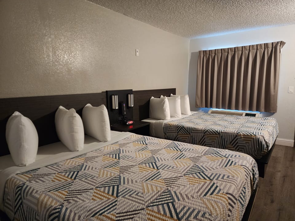 Desk, blackout drapes, iron/ironing board, free WiFi