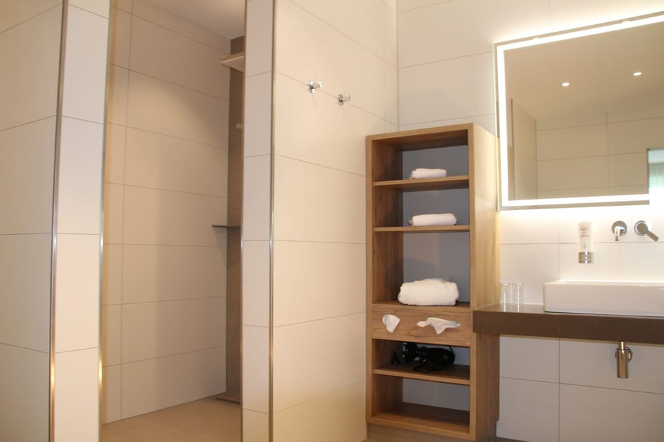 Hair dryer, bathrobes, slippers, towels