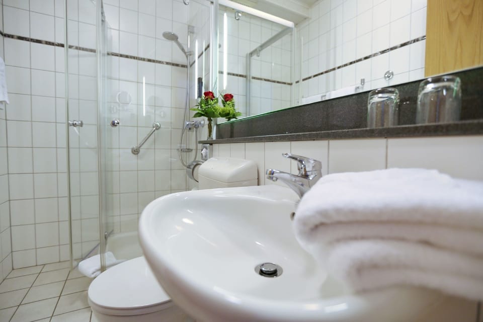 Comfort Double Room Single Use, 1 Bedroom | Bathroom | Shower, hair dryer, towels, soap