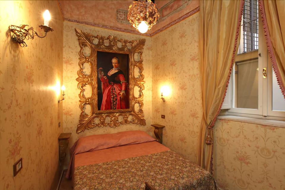 Standard Double Room | Minibar, in-room safe, desk, blackout drapes
